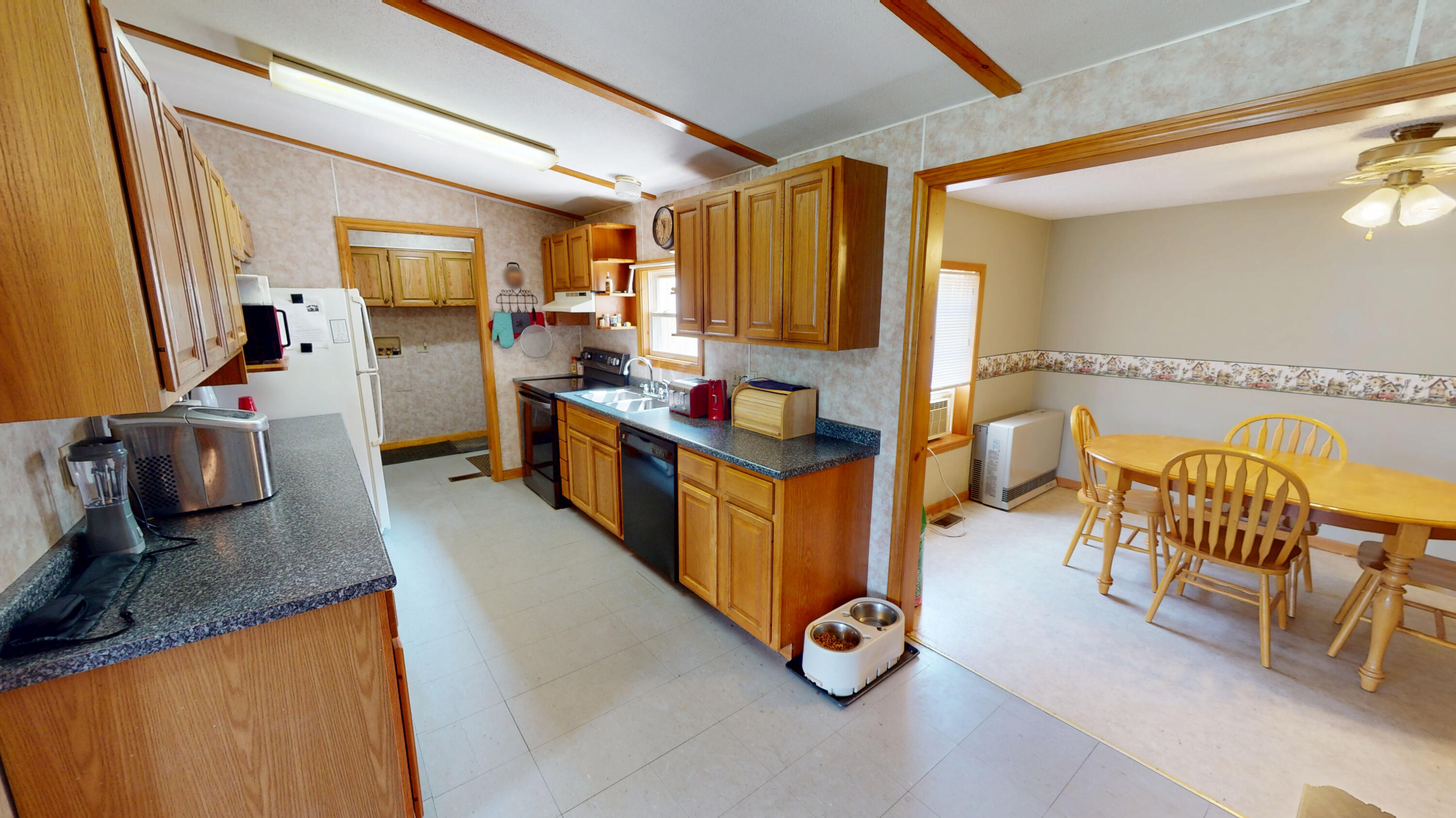 305 Kennebec River Road Embden, ME 04958 - Photo 5 of 26 Kitchen Dining Room