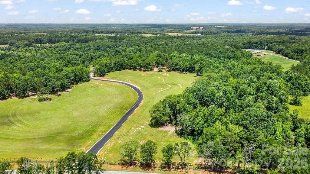 141 Flowing Rock Road Honea Path, SC 29654 - Photo 7 of 10 a view of a yard and swimming pool