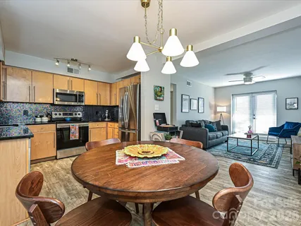 a view of a dining room with furniture