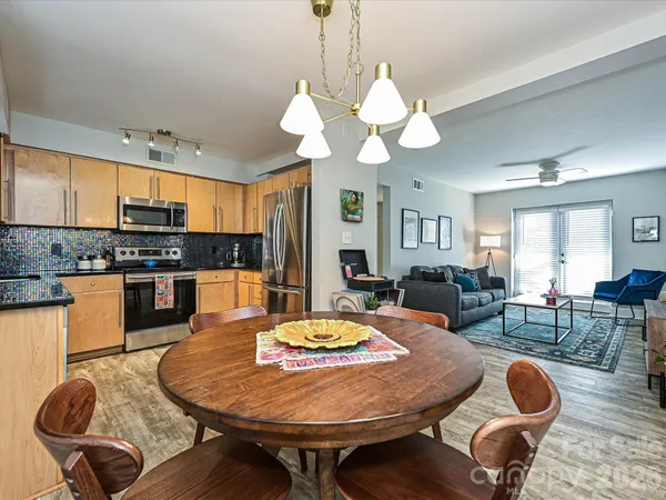 a view of a dining room with furniture