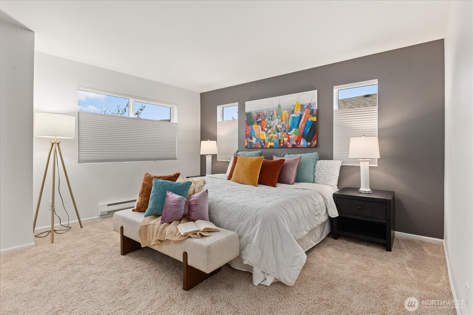 6011 29th Avenue Southwest Seattle, WA 98126 - Photo 11 of 29 a bedroom with a bed and a painting