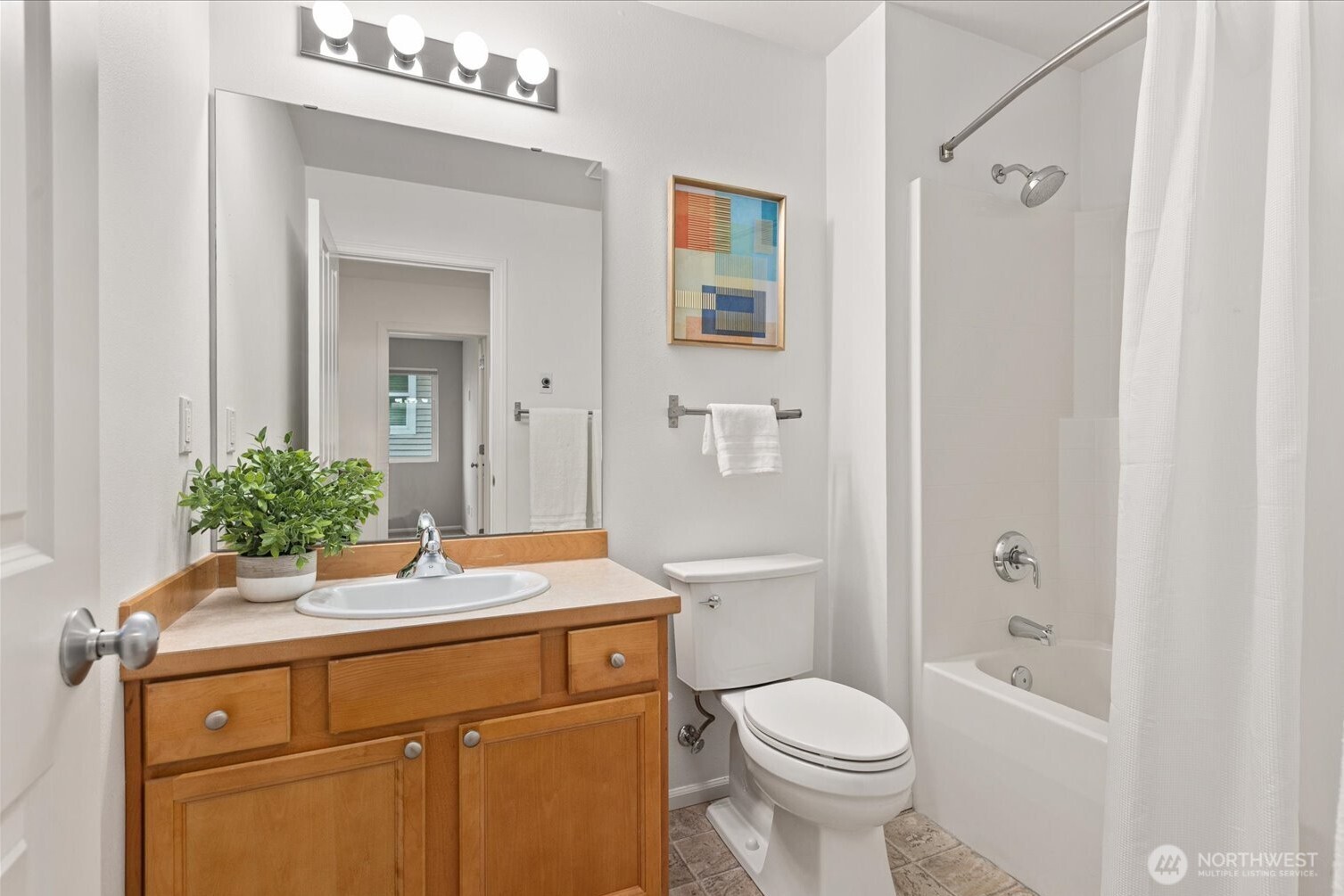 6011 29th Avenue Southwest Seattle, WA 98126 - Photo 18 of 29 a bathroom with a sink toilet and shower