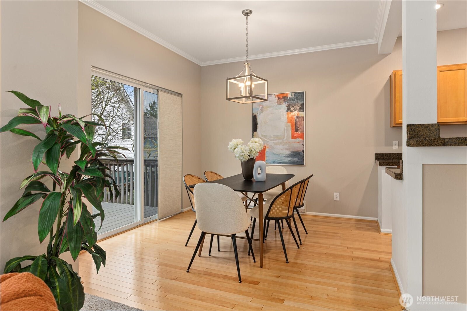 6011 29th Avenue Southwest Seattle, WA 98126 - Photo 9 of 29 a view of a dining room with furniture window and wooden floor