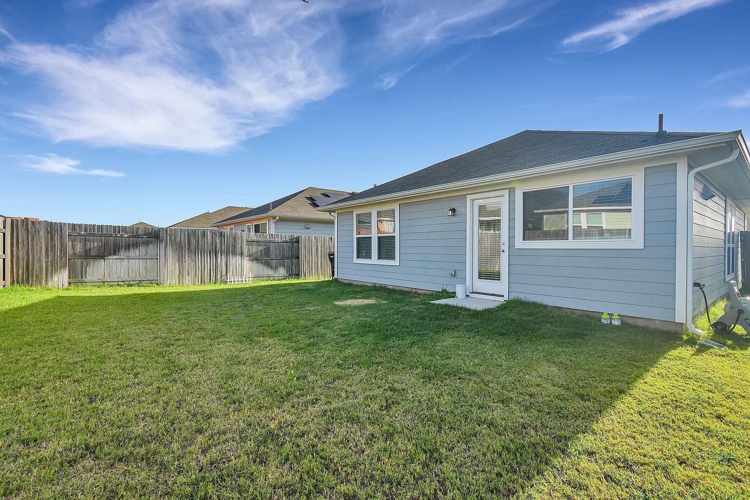 121 Crescent Street Georgetown, TX 78626 - Photo 22 of 27 Back of property featuring a fenced backyard
