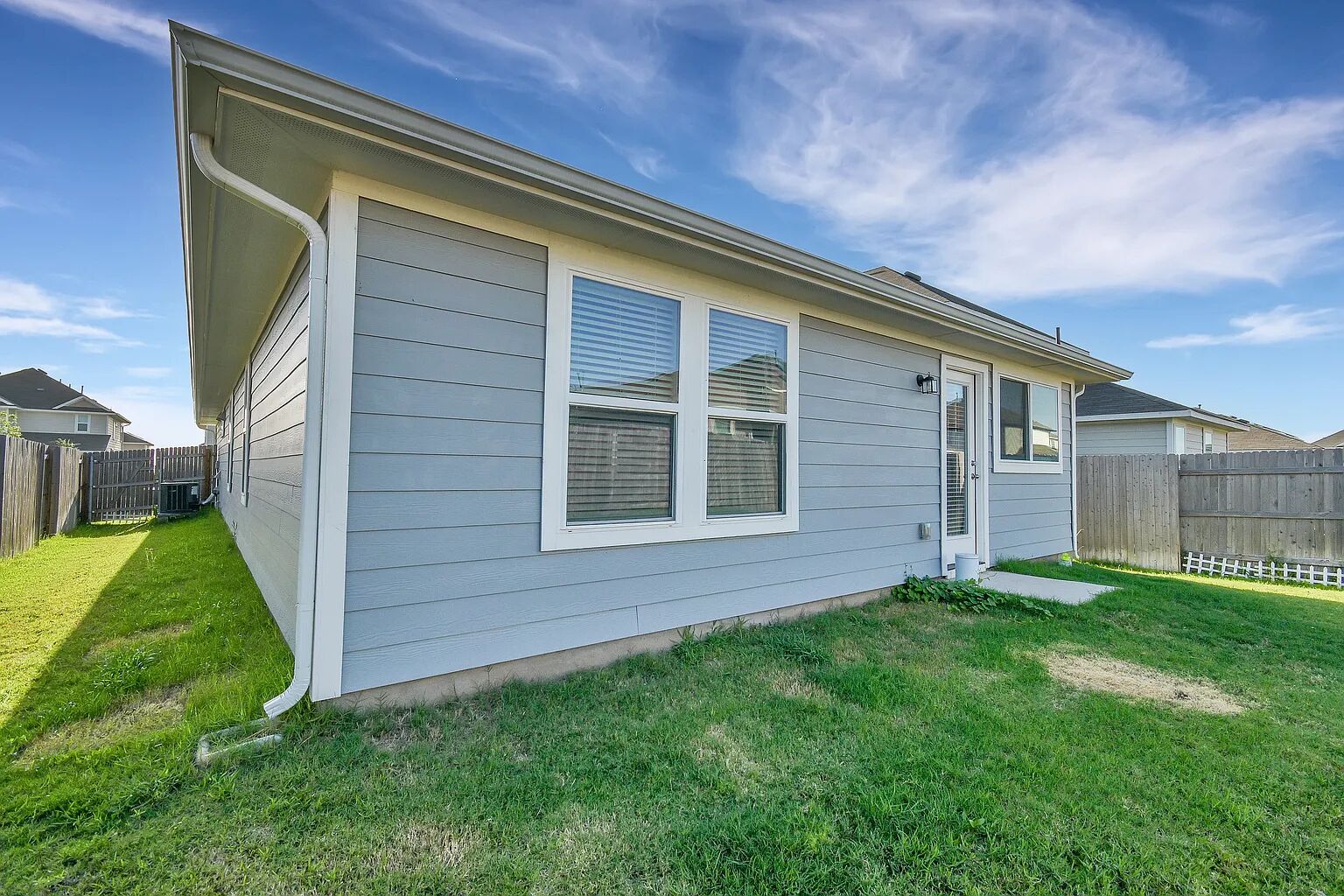 121 Crescent Street Georgetown, TX 78626 - Photo 23 of 27 Rear view of house featuring a fenced backyard