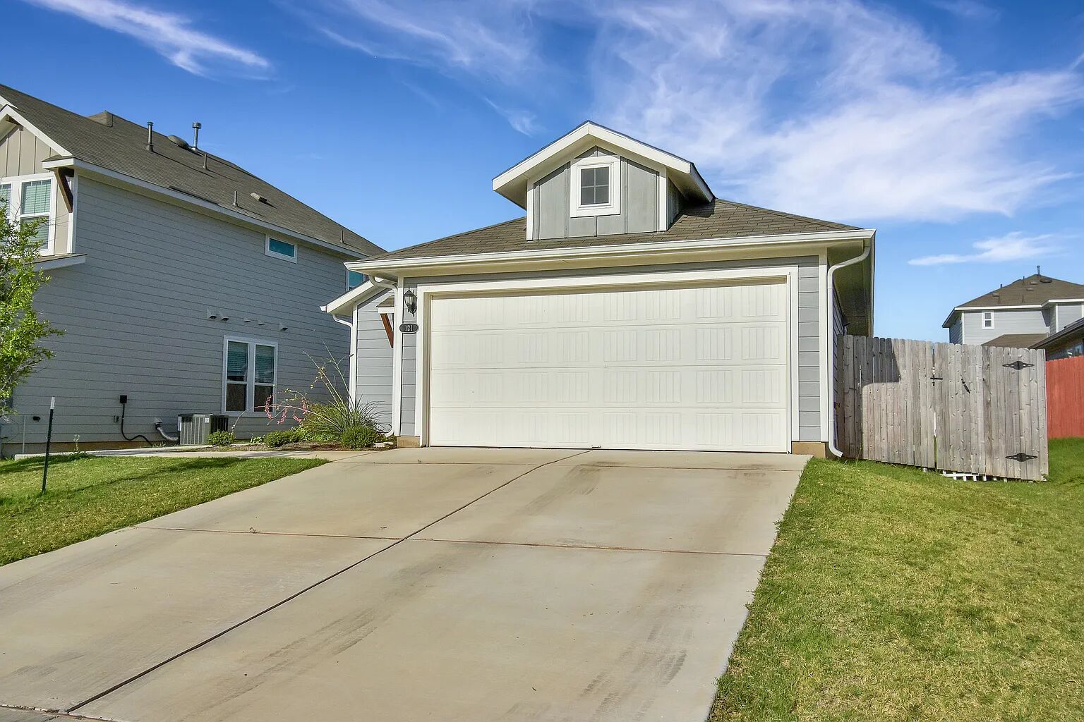 121 Crescent Street Georgetown, TX 78626 - Photo 4 of 27 View of front of property featuring a garage and concrete driveway
