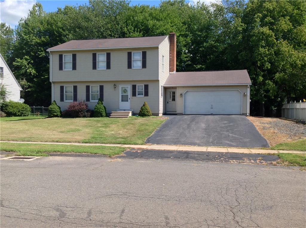 43 Foxcroft Road Enfield, CT 06082 - Photo 1 of 1 a front view of a house with a yard and garage