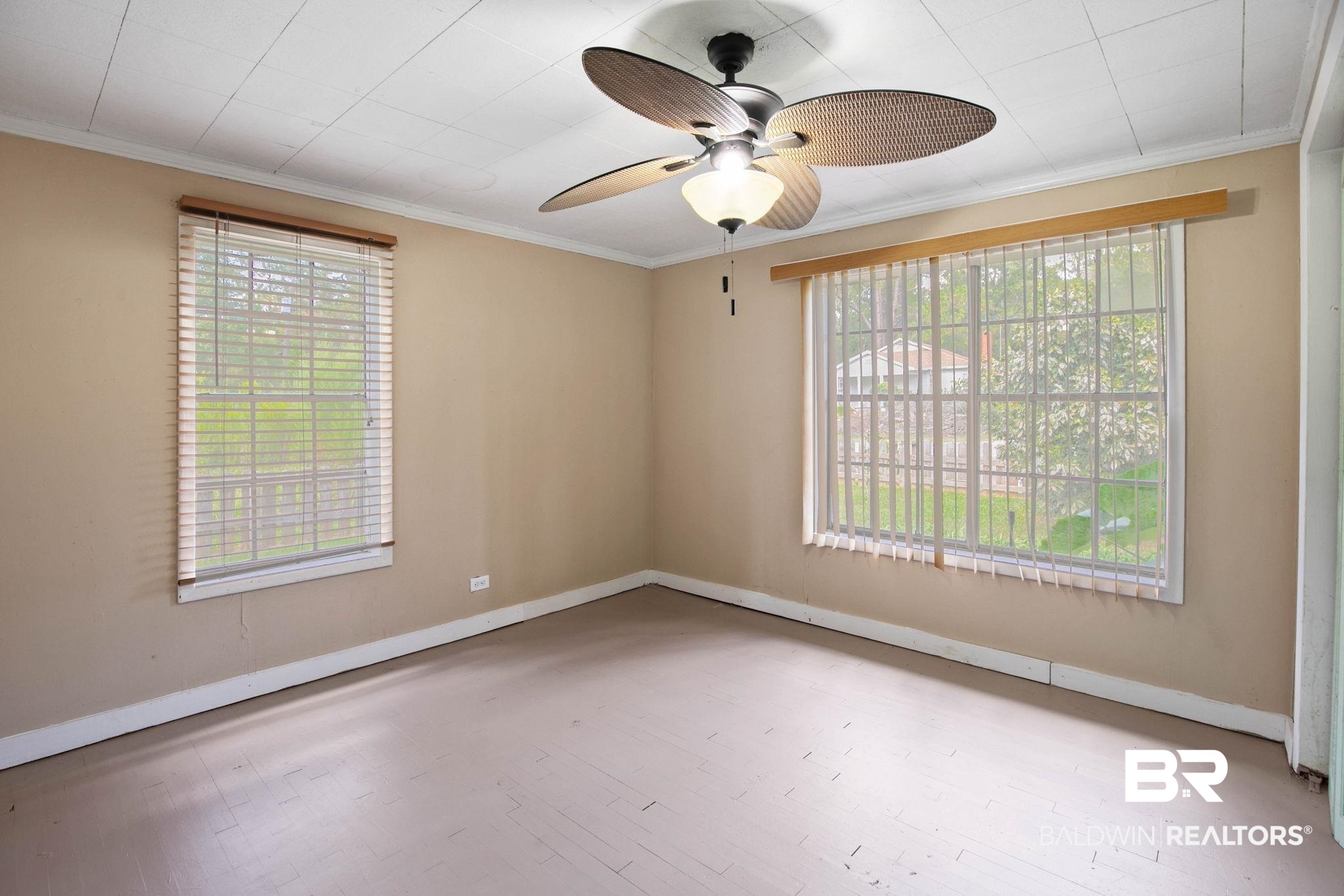 23240 County Road 47 Perdido, AL 36562 - Photo 19 of 29 Spare room with ornamental molding, light wood-type flooring, and a ceiling fan