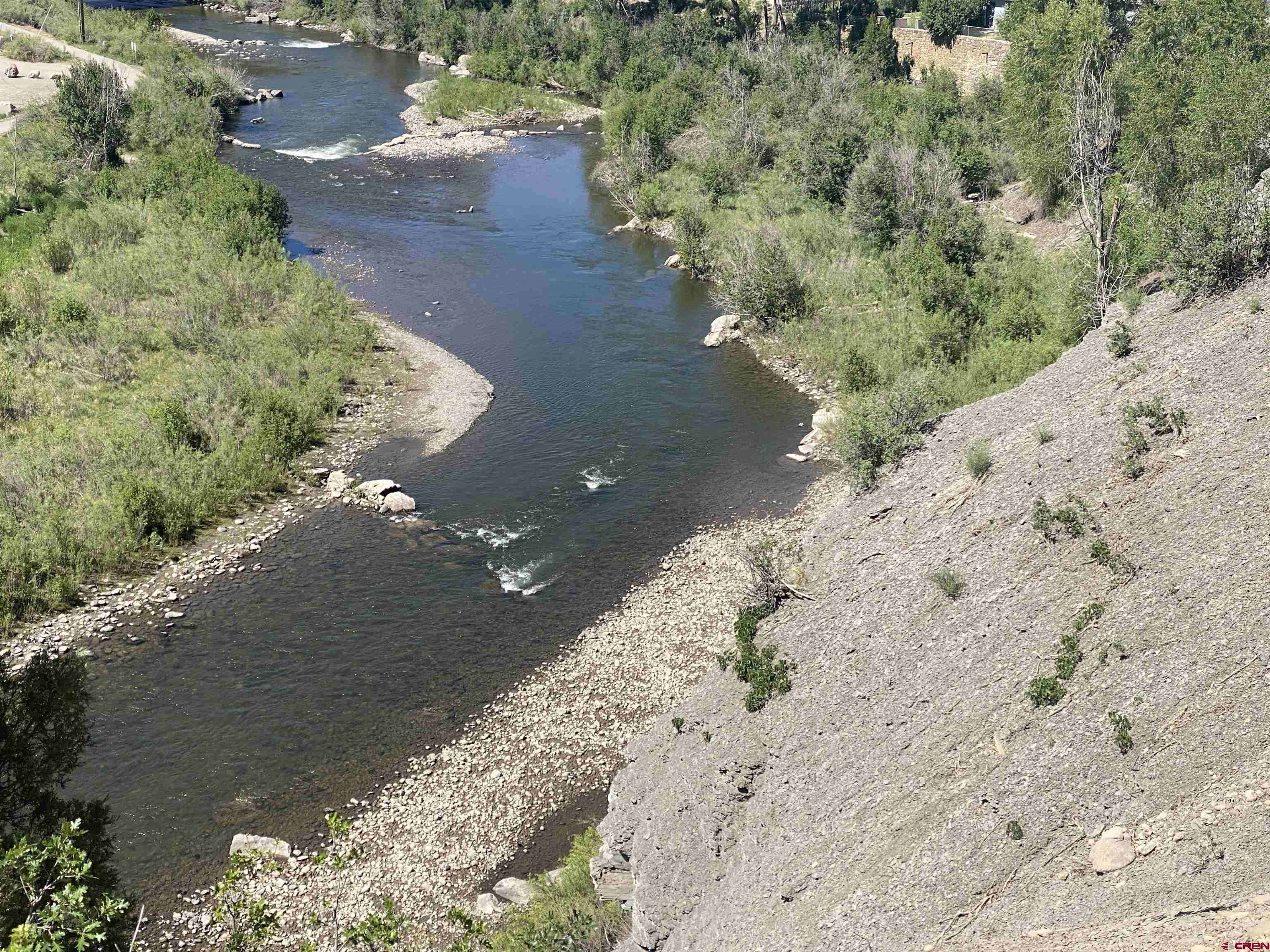 X Rumbaugh Road Pagosa Springs, CO 81147 - Photo 10 of 21 a view of a lake with beach