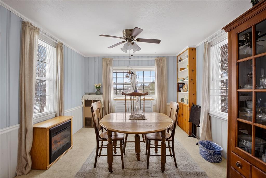 4241 Greenridge Road Pittsburgh, PA 15234 - Photo 16 of 50 a dining room with furniture window and wooden floor