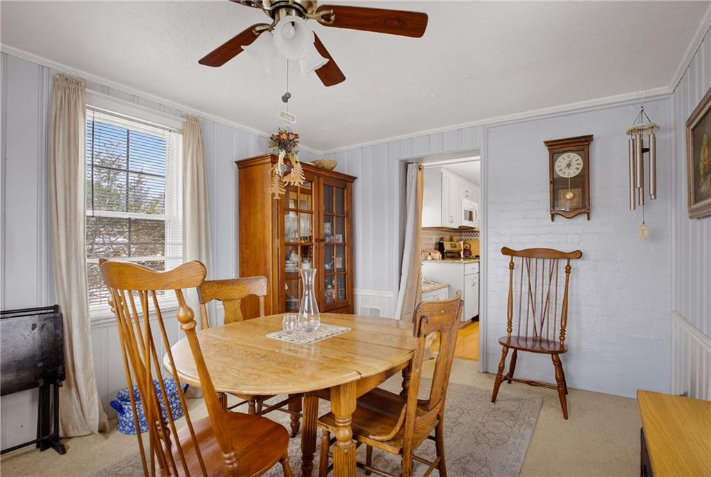 4241 Greenridge Road Pittsburgh, PA 15234 - Photo 17 of 50 a view of a dining room with furniture and window