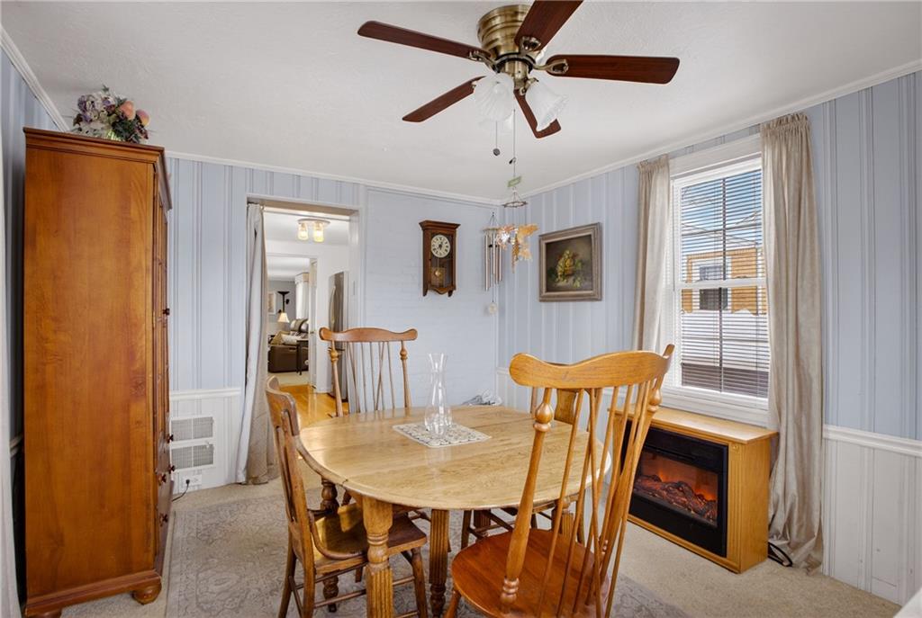 4241 Greenridge Road Pittsburgh, PA 15234 - Photo 18 of 50 a view of a dining room with furniture and a chandelier