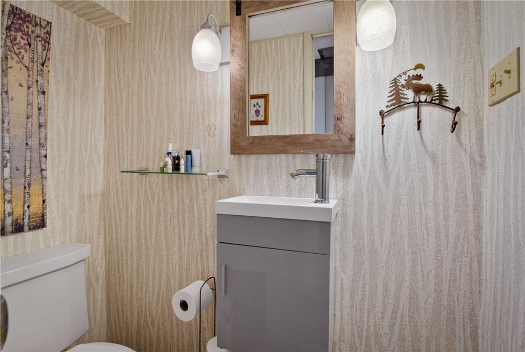 4241 Greenridge Road Pittsburgh, PA 15234 - Photo 31 of 50 a bathroom with a sink a toilet and mirror