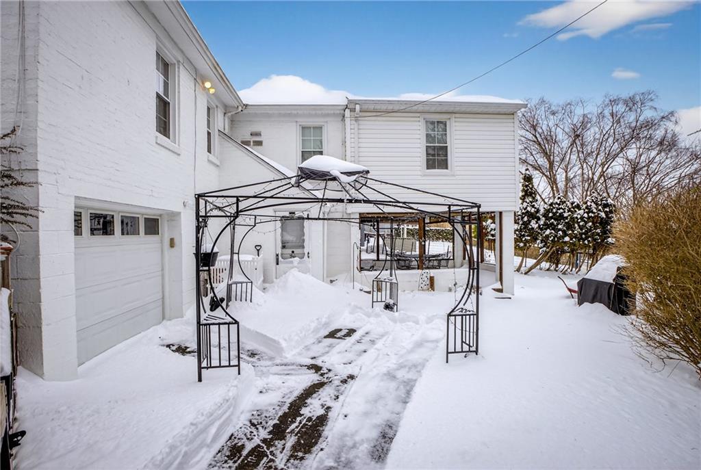 4241 Greenridge Road Pittsburgh, PA 15234 - Photo 35 of 50 a view of a livingroom with furniture and a hallway