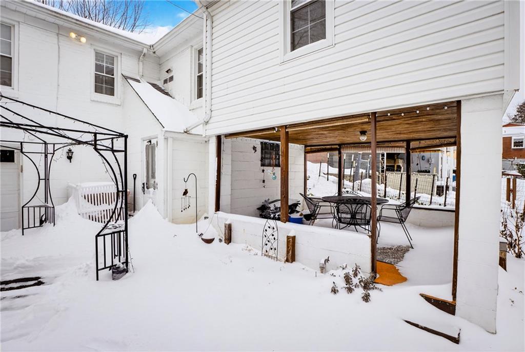 4241 Greenridge Road Pittsburgh, PA 15234 - Photo 36 of 50 a view of a patio with table and chairs