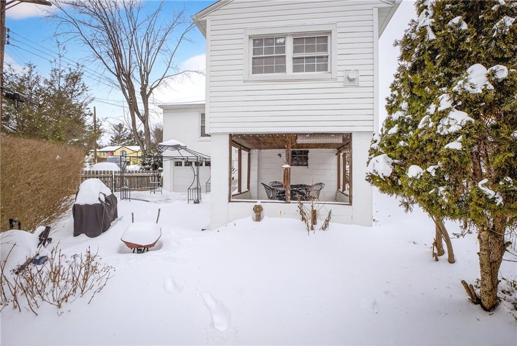 4241 Greenridge Road Pittsburgh, PA 15234 - Photo 37 of 50 a view of a house with backyard and sitting area