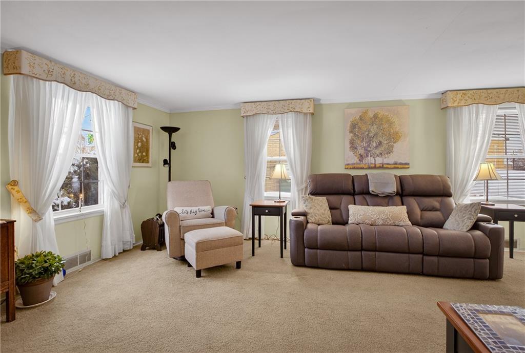 4241 Greenridge Road Pittsburgh, PA 15234 - Photo 9 of 50 a living room with furniture and a large window