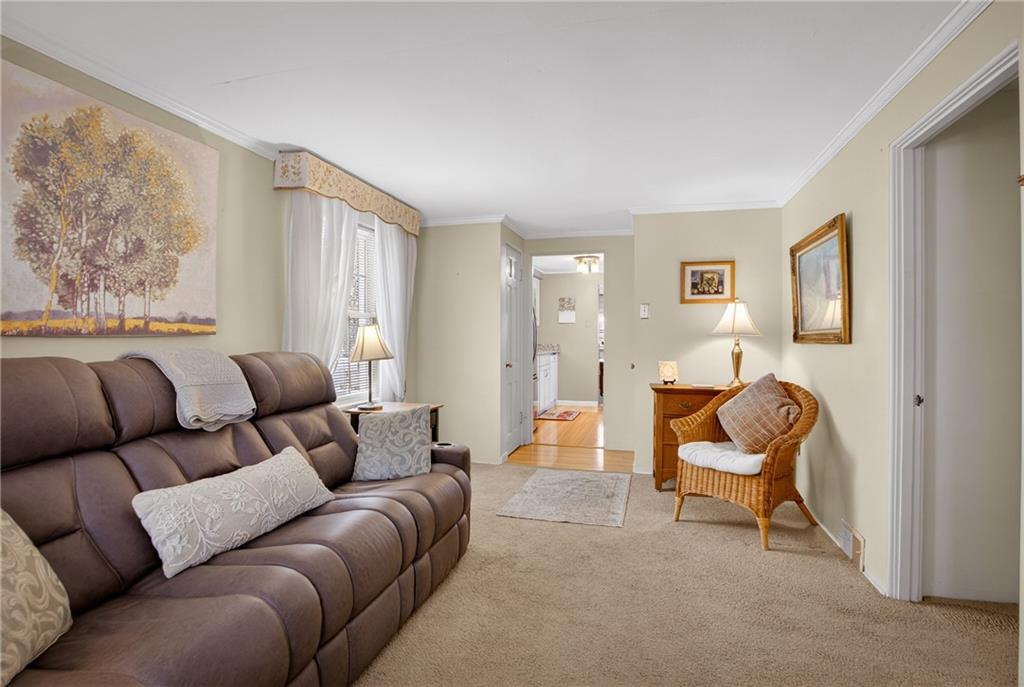 4241 Greenridge Road Pittsburgh, PA 15234 - Photo 10 of 50 a living room with furniture and a window