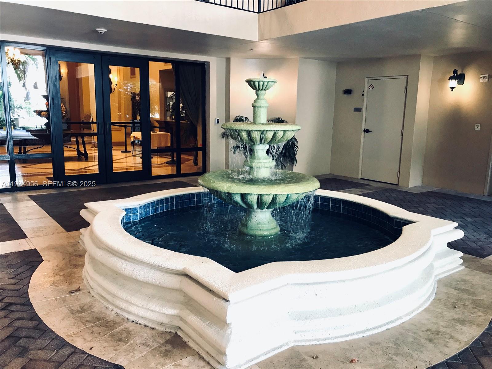 888 Douglas Road, Unit PH04 Coral Gables, FL 33134 - Photo 14 of 15 Welcoming Fountain at Entry