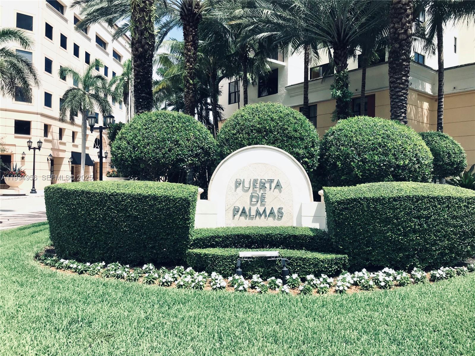 888 Douglas Road, Unit PH04 Coral Gables, FL 33134 - Photo 2 of 15 Exterior Signage at Historic Douglas Entrance