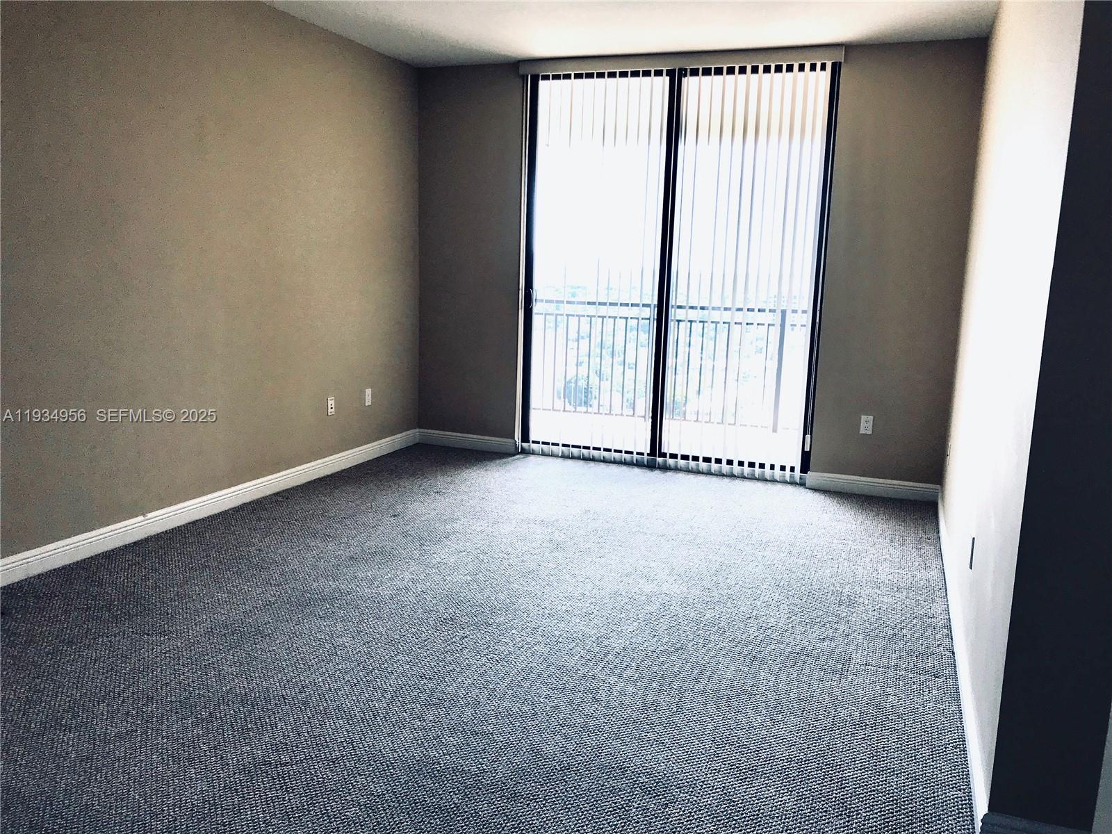 888 Douglas Road, Unit PH04 Coral Gables, FL 33134 - Photo 6 of 15 Living Room to Balcony