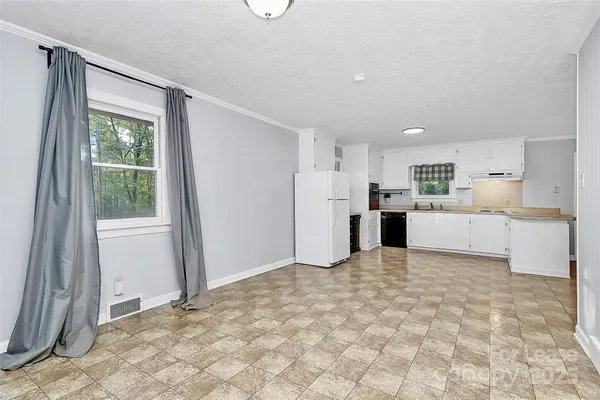 a view of a kitchen with a sink