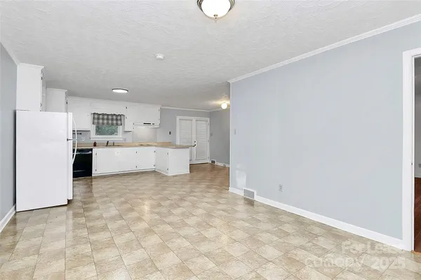 a view of a kitchen with a sink