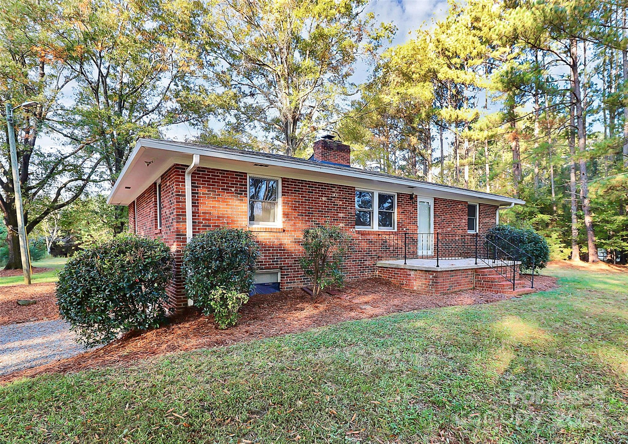 3685 Old Salisbury-Concord Road Concord, NC 28025 - Photo 5 of 33 a front view of house with yard and green space