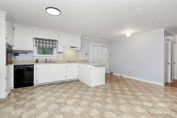 a view of kitchen with a sink
