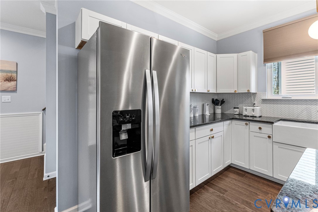 123 8th Street Colonial Beach, VA 22443 - Photo 11 of 36 a kitchen with stainless steel appliances granite countertop a refrigerator and a stove top oven