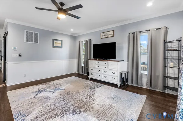 a view of livingroom with furniture and flat screen tv