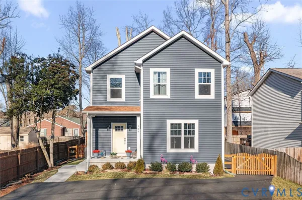 a front view of a house with yard