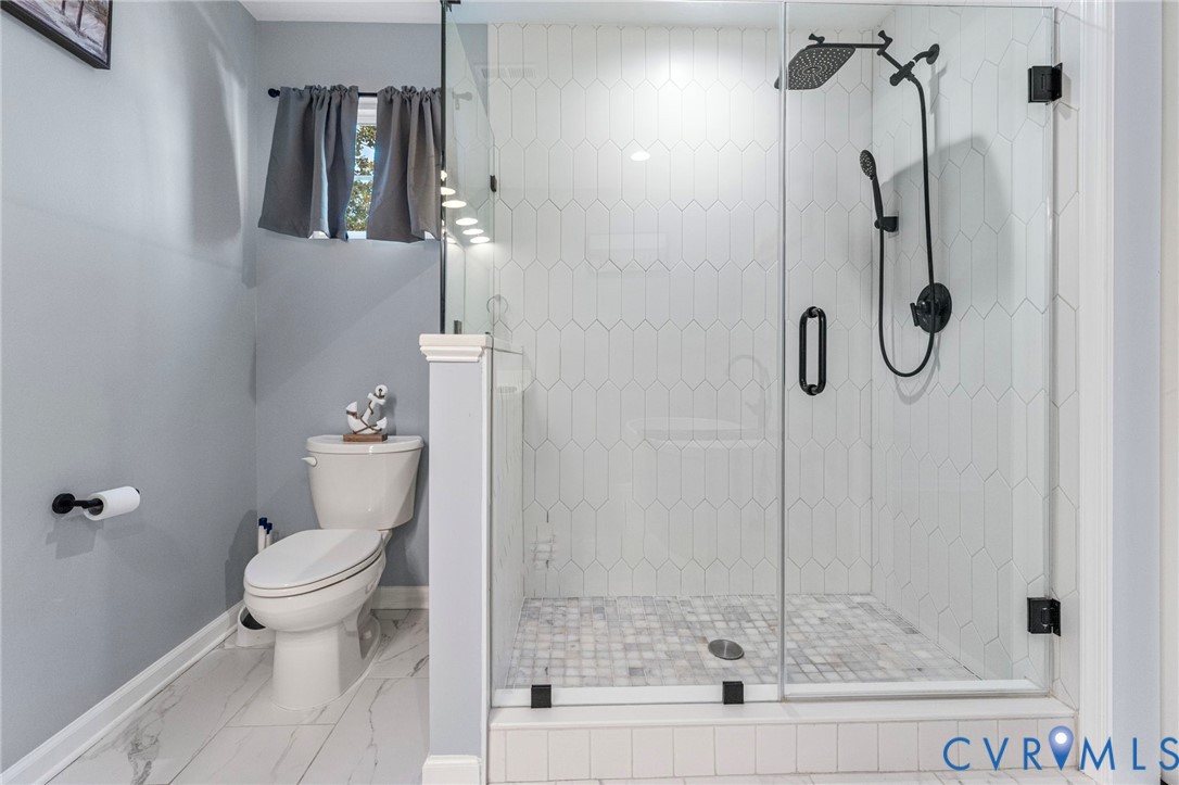 123 8th Street Colonial Beach, VA 22443 - Photo 24 of 40 a bathroom with a shower
