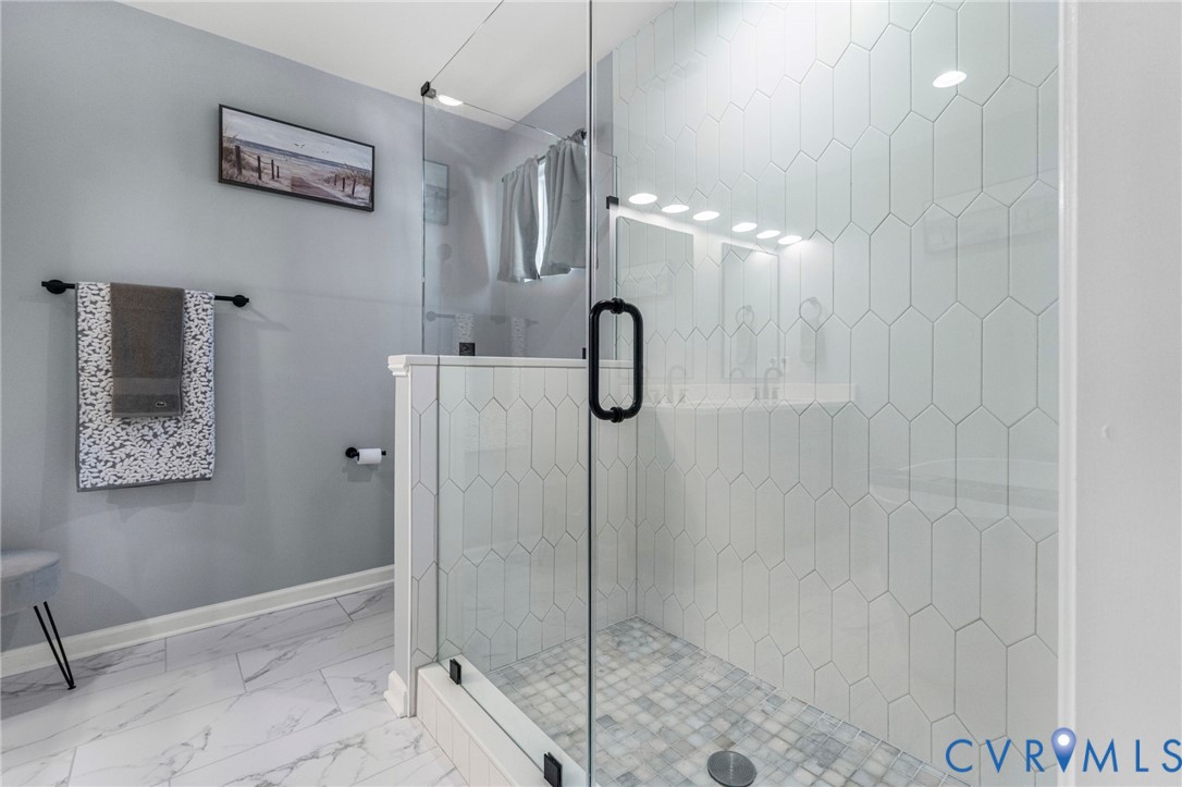 123 8th Street Colonial Beach, VA 22443 - Photo 24 of 36 a bathroom with a shower