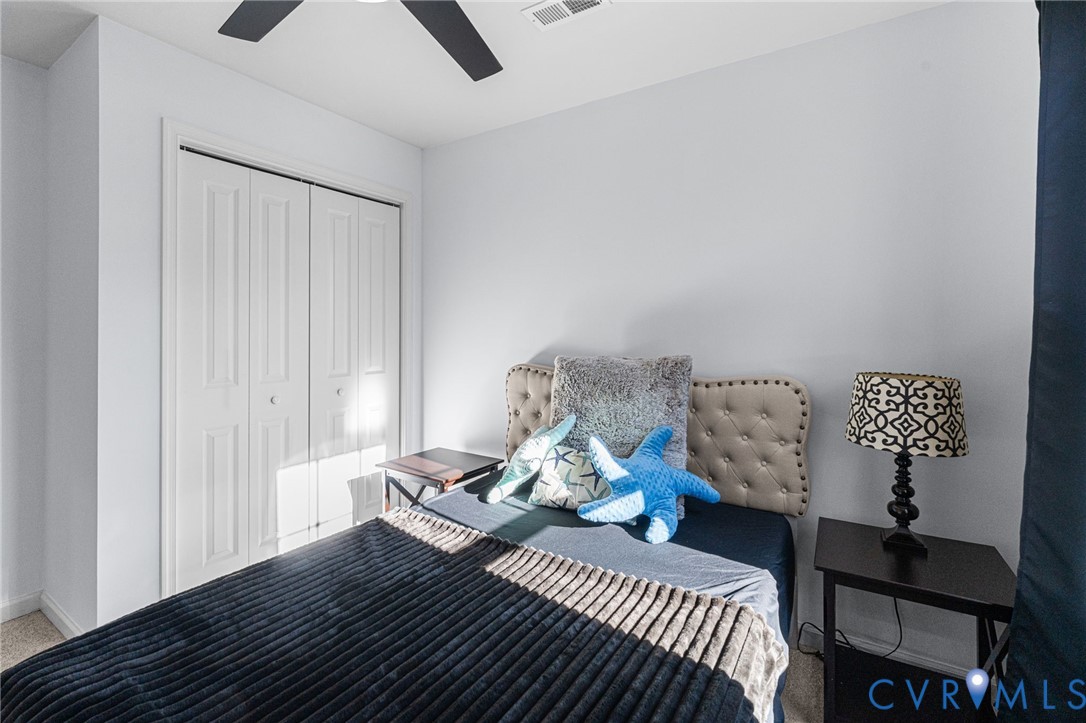 123 8th Street Colonial Beach, VA 22443 - Photo 33 of 40 a living room with furniture and wooden floor