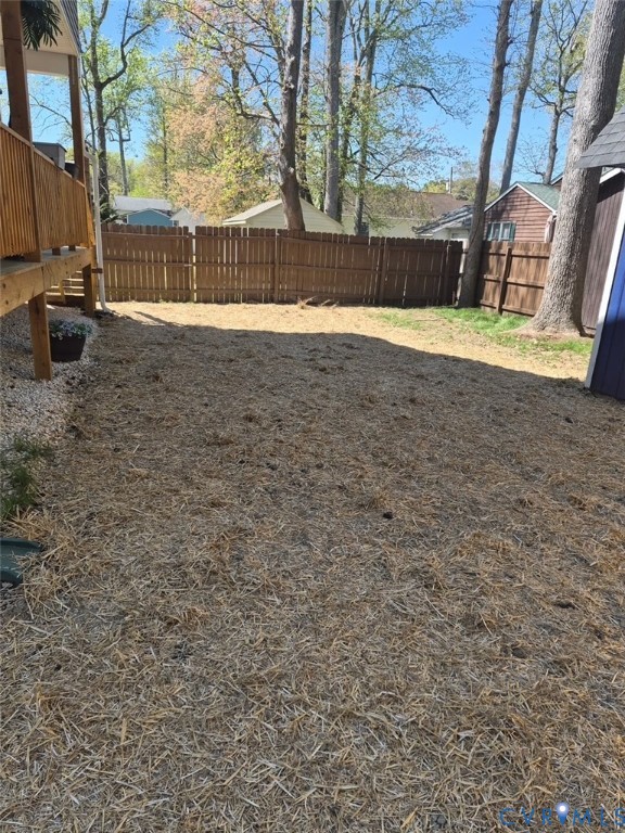 123 8th Street Colonial Beach, VA 22443 - Photo 34 of 36 a view of a yard with wooden fence