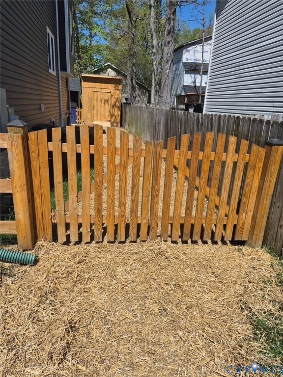 123 8th Street Colonial Beach, VA 22443 - Photo 36 of 36 a view of a building with wooden fence