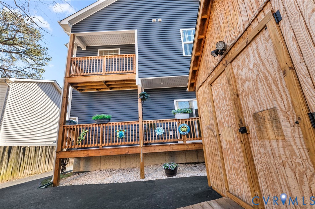 123 8th Street Colonial Beach, VA 22443 - Photo 39 of 40 a view of a house with a small deck
