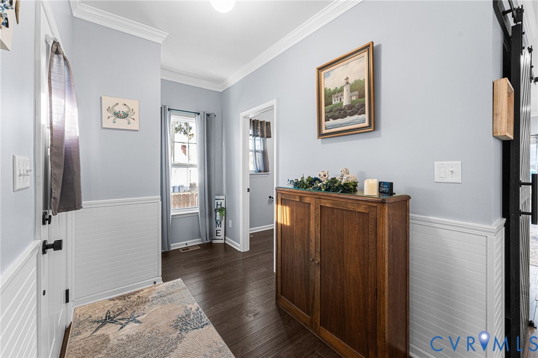 123 8th Street Colonial Beach, VA 22443 - Photo 4 of 36 a bedroom with furniture and a window
