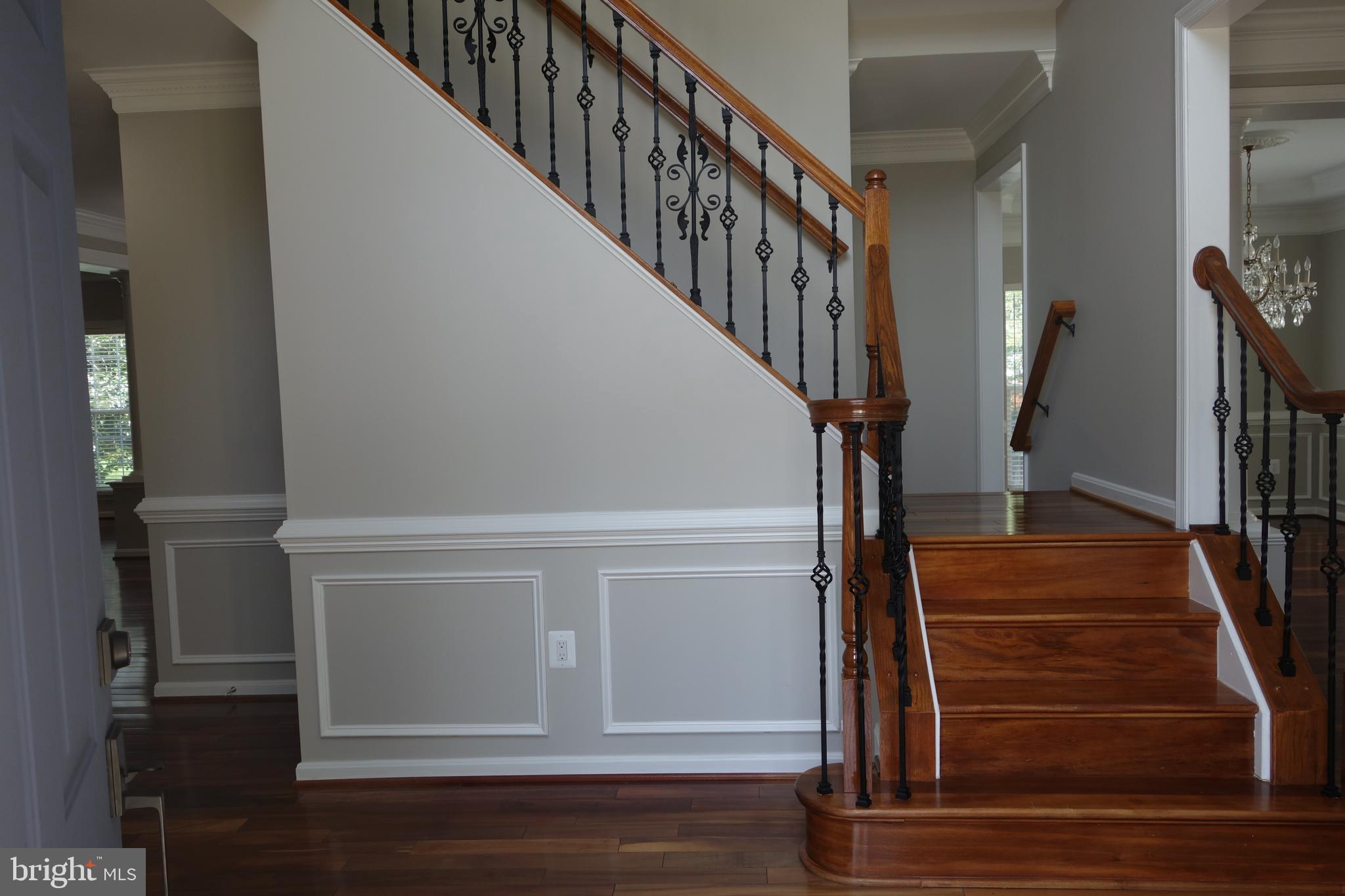 8196 Tenbrook Drive Gainesville, VA 20155 - Photo 11 of 51 a view of entryway and hall with wooden floor