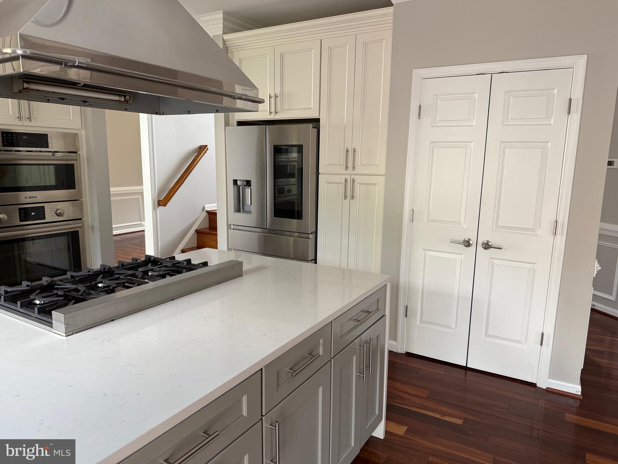 8196 Tenbrook Drive Gainesville, VA 20155 - Photo 19 of 51 a kitchen with sink cabinets and a stove