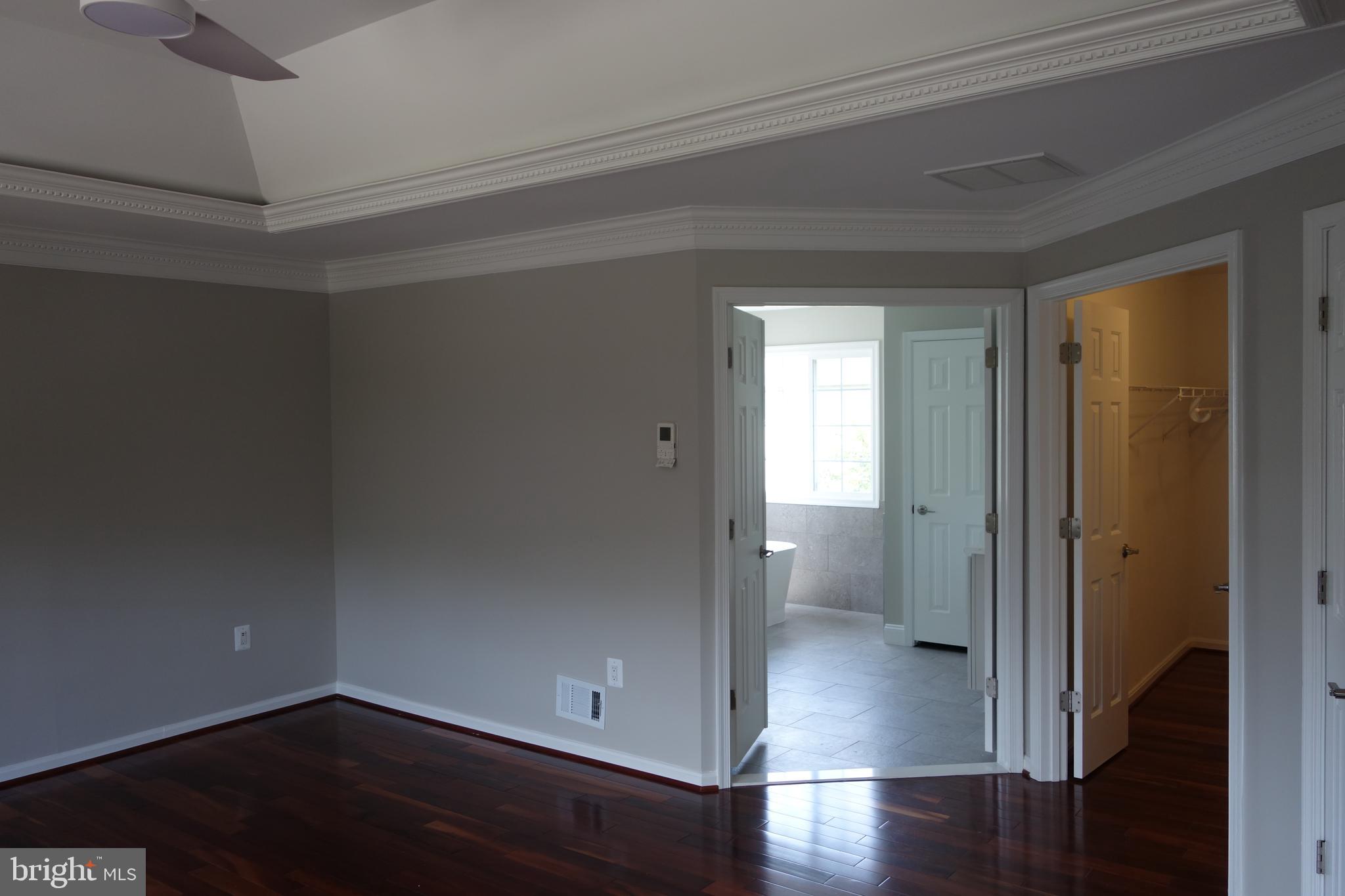 8196 Tenbrook Drive Gainesville, VA 20155 - Photo 27 of 51 a view of a room with wooden floor