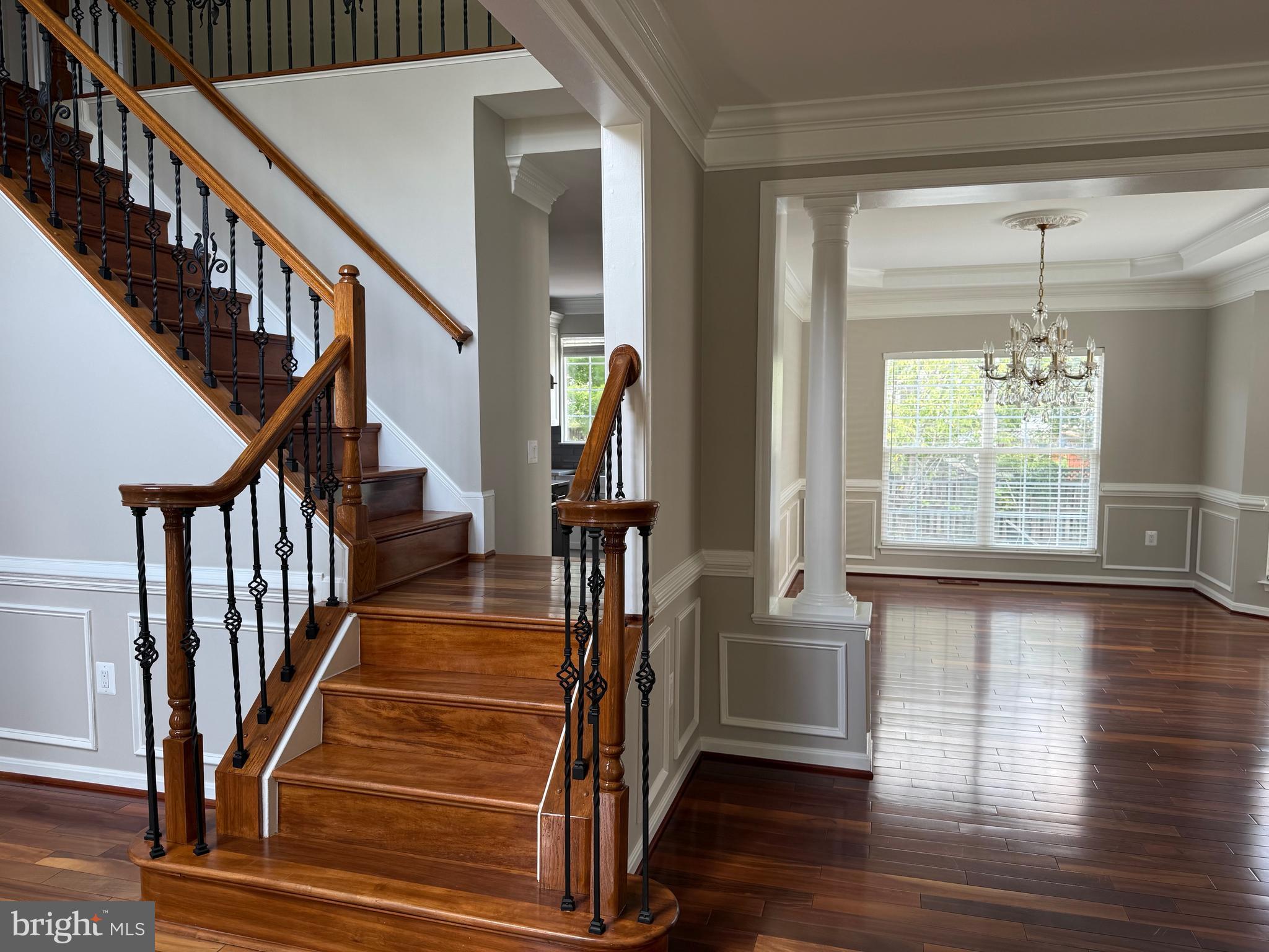 8196 Tenbrook Drive Gainesville, VA 20155 - Photo 3 of 51 a view of entryway and hall with wooden floor