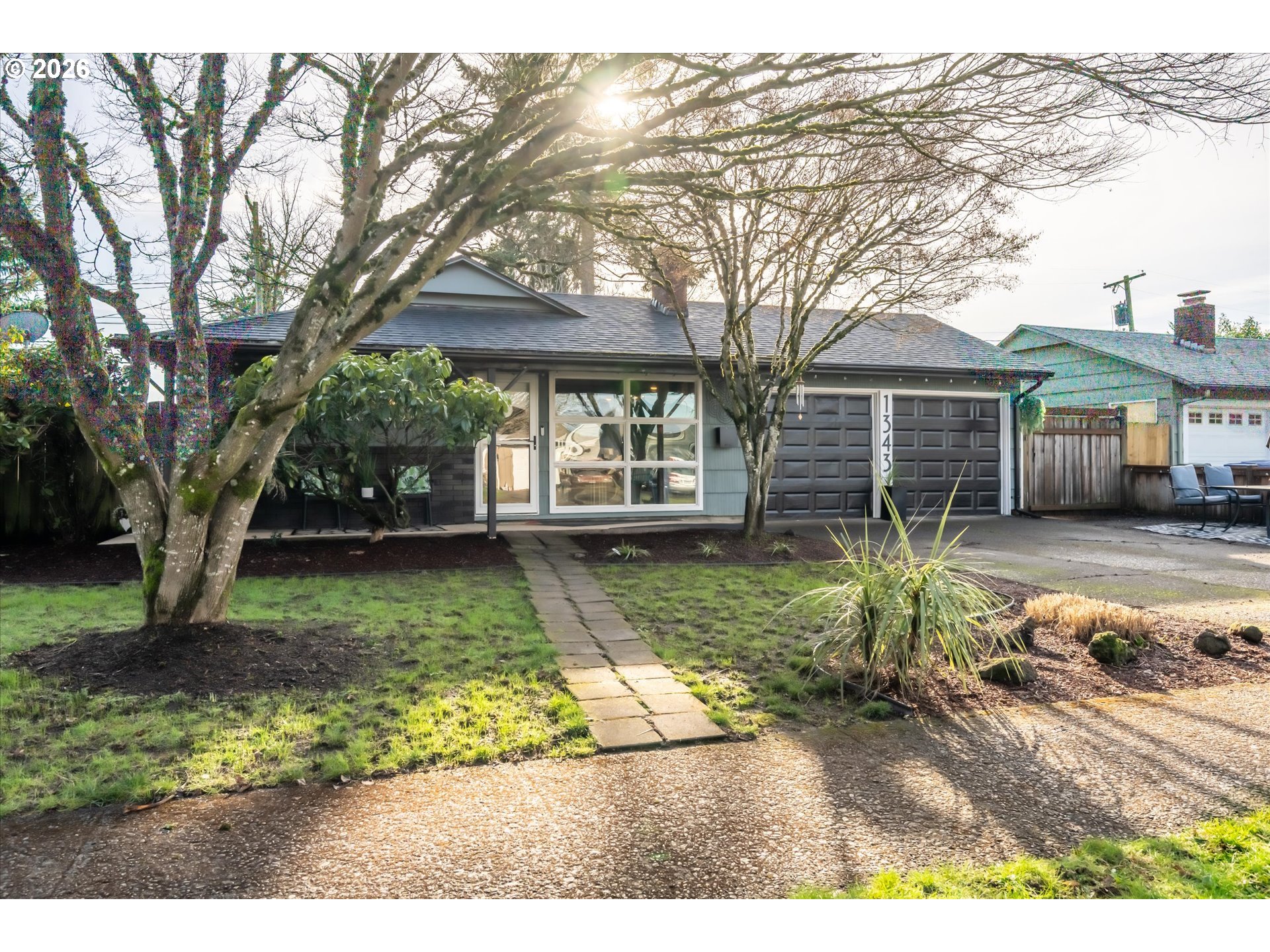 front view of a house with a yard