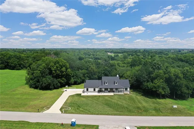 $889,000 | 816 Eve Orchid Drive, Greenwood, MO 64034