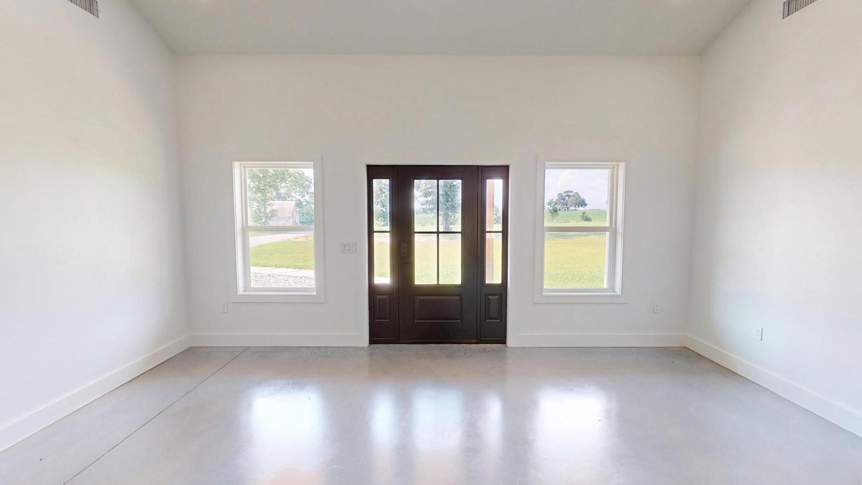 37837 Straughn School Road Andalusia, AL 36421 - Photo 13 of 30 an empty room with windows