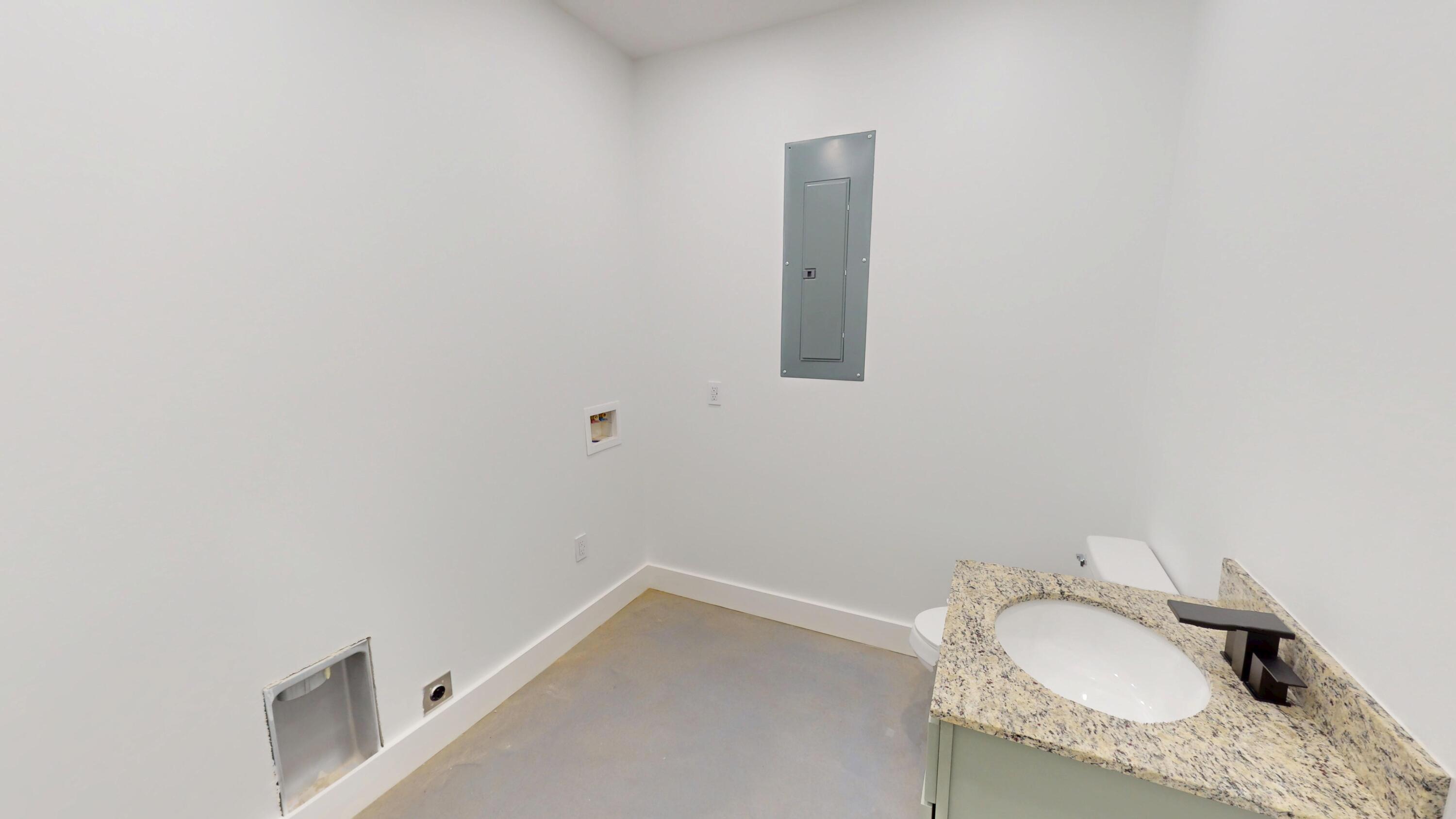 37837 Straughn School Road Andalusia, AL 36421 - Photo 6 of 30 a bathroom with a granite countertop sink and a mirror