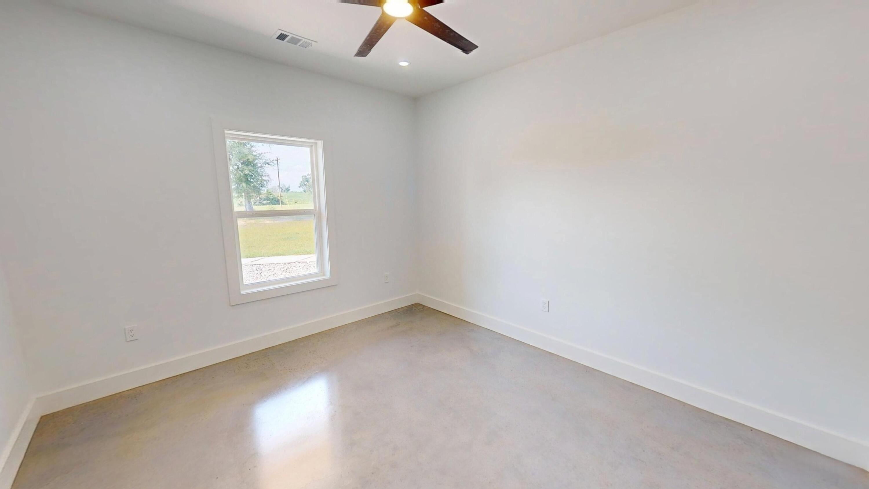 37837 Straughn School Road Andalusia, AL 36421 - Photo 10 of 30 an empty room with a window
