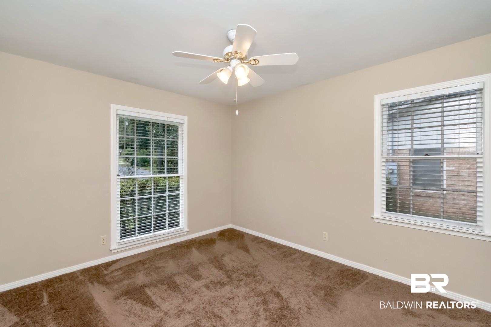 324 Judson Drive Mobile, AL 36608 - Photo 12 of 20 Spare room with carpet floors, a ceiling fan, and healthy amount of natural light