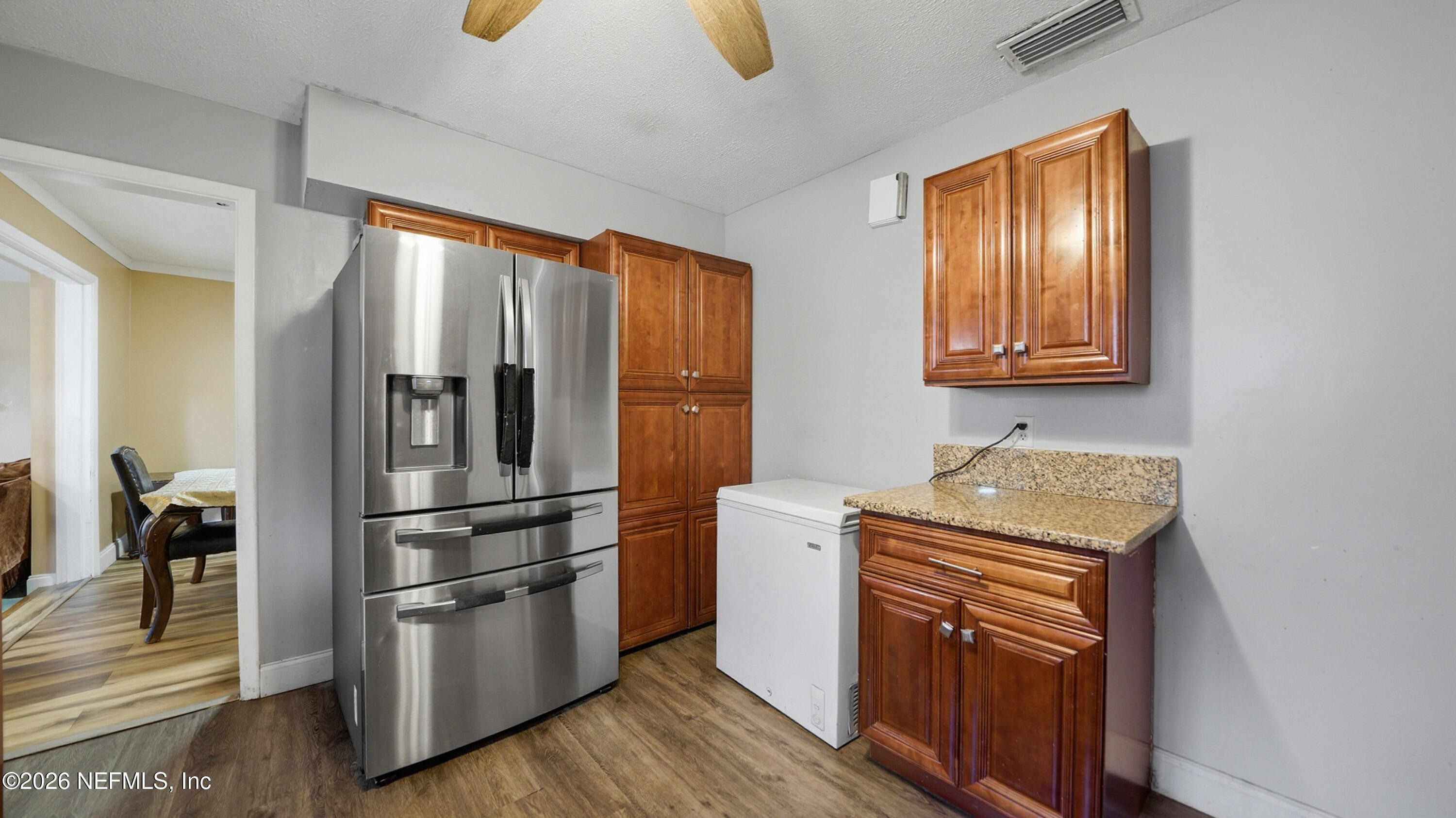 2238 Ligustrum Road Jacksonville, FL 32211 - Photo 14 of 31 a kitchen with stainless steel appliances granite countertop a refrigerator and a sink